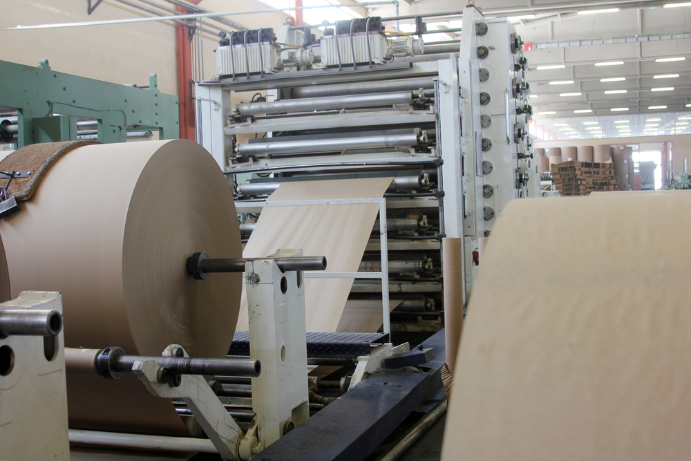 Corrugated box manufacturing machinery at ACES Inc. carton box factory Bangladesh